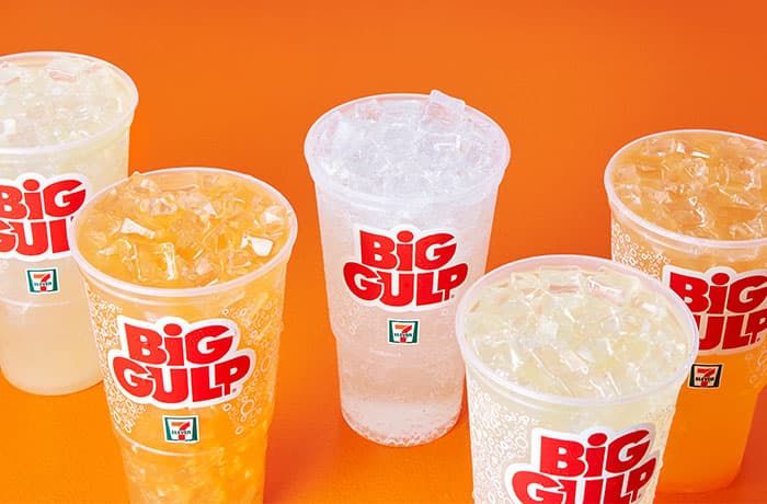 Five Big Gulp cups filled with sodas.